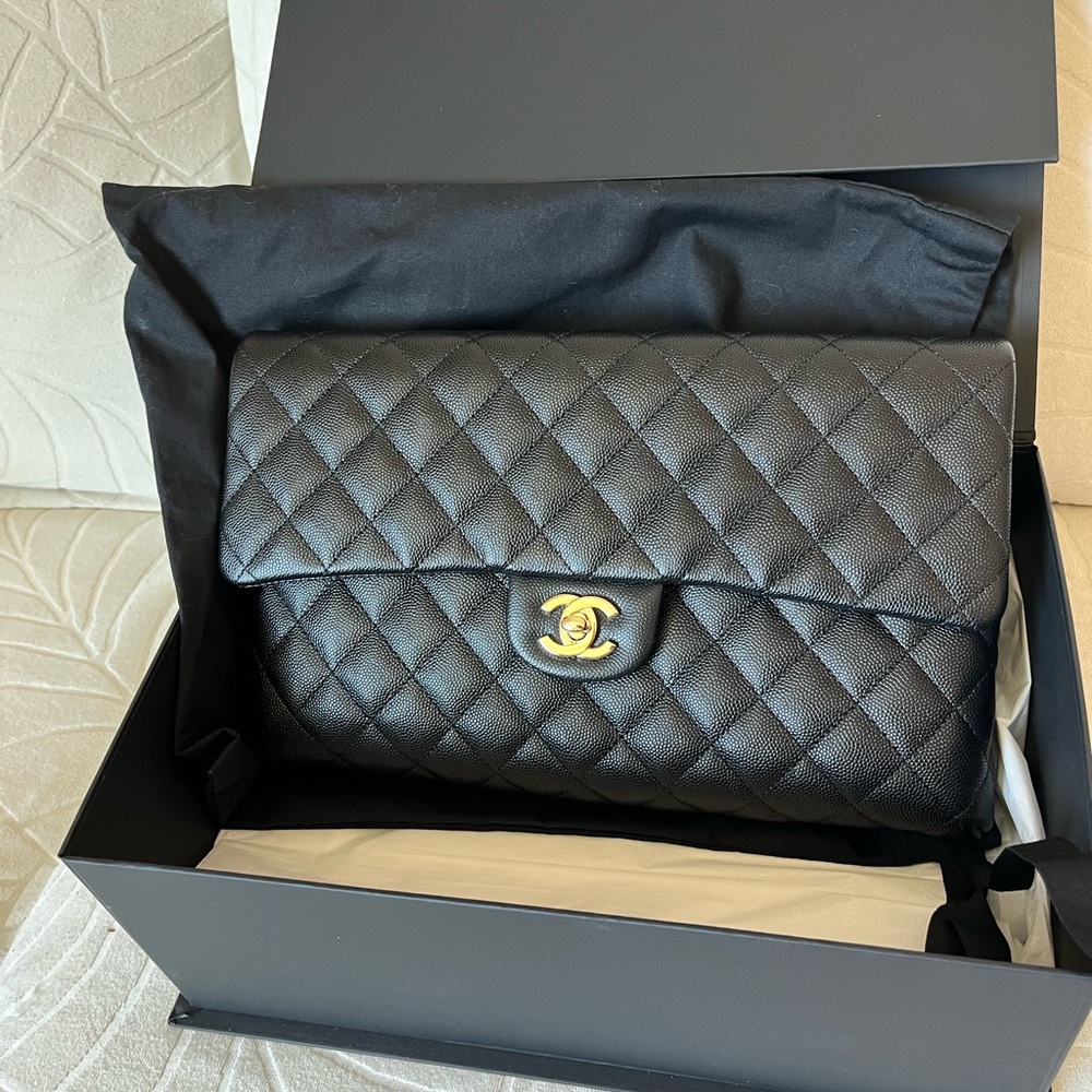 CHANEL Black Quilted Caviar Clutch with Gold Hardware